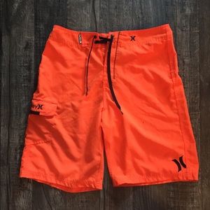 ORANGE HURLEY BOARD SHORTS SIZE 31